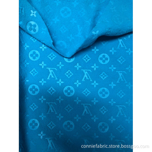 Polaire polaire 100% polyester avec motif LV en relief